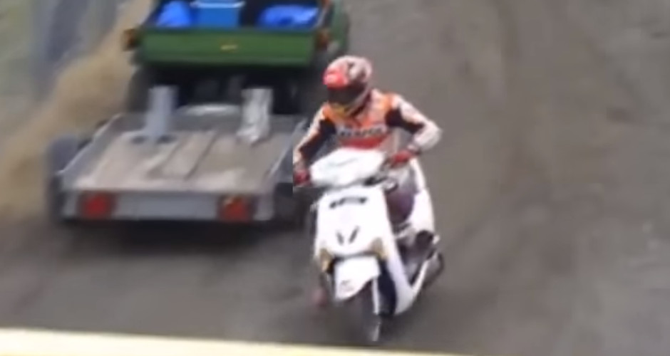 MotoGP racer takes off on a photographer’s scooter after crashing